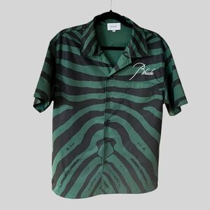 Rhude Men’s Black Tag on Dark Green Fabric